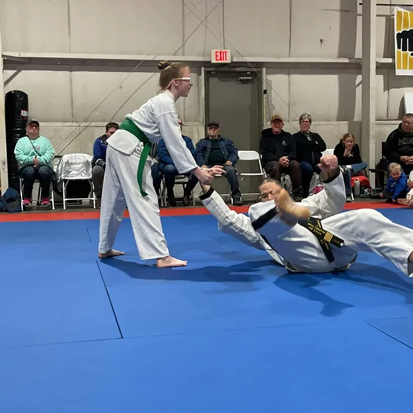 Teen students sparring with protective gear